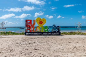 Pé na areia, Praia do Francês